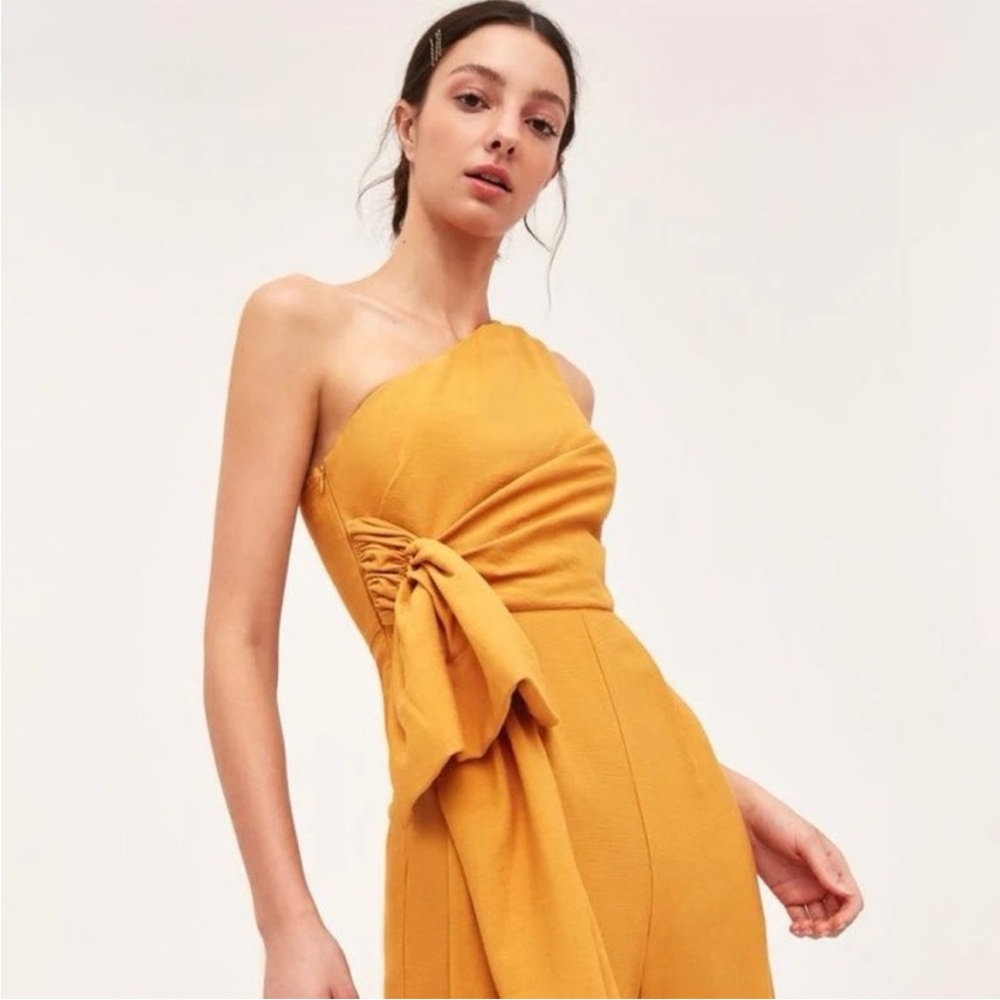 C MEO COLLECTIVE ONE SHOULDER JUMP SUIT BUTTERCUP COLOR WITH SIDE SASH SZ SMALL